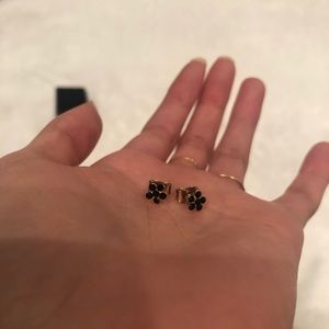 Black floral earrings.